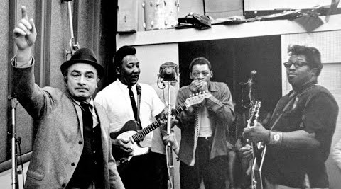 Recording session at the historic Chess Studios in Chicago, featuring key figures in American blues music.