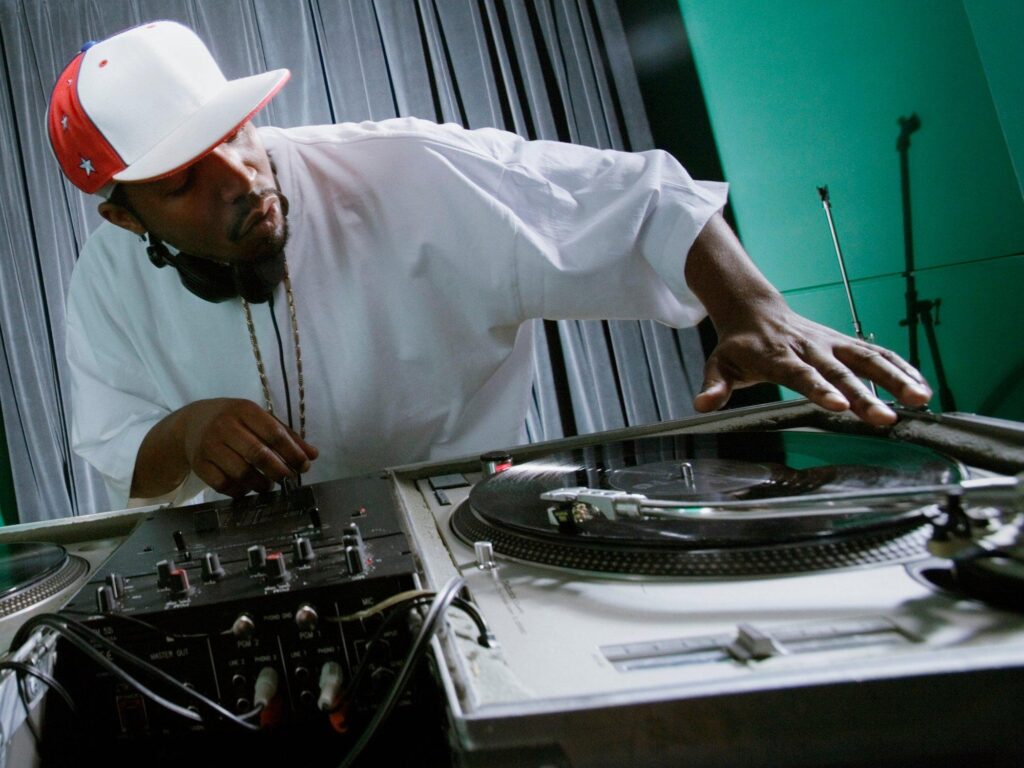 Hip hop production & Sampling - Grandmaster Flash, a pioneering DJ and musician who was instrumental in the development of hip-hop music.